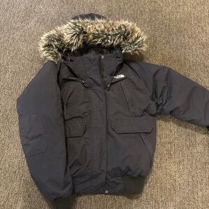 The North Face women’s  Black Hooded Parka Jacket with Faux Fur Trim